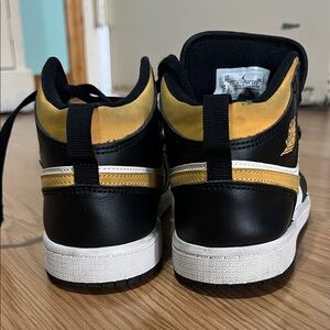 Nike Kids Black and Gold Sneakers air Jordan